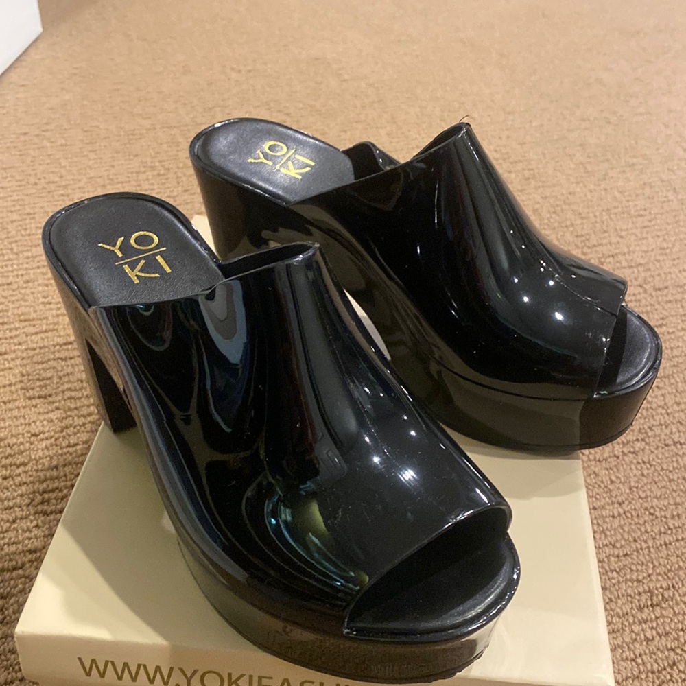 Platform Mules in black.